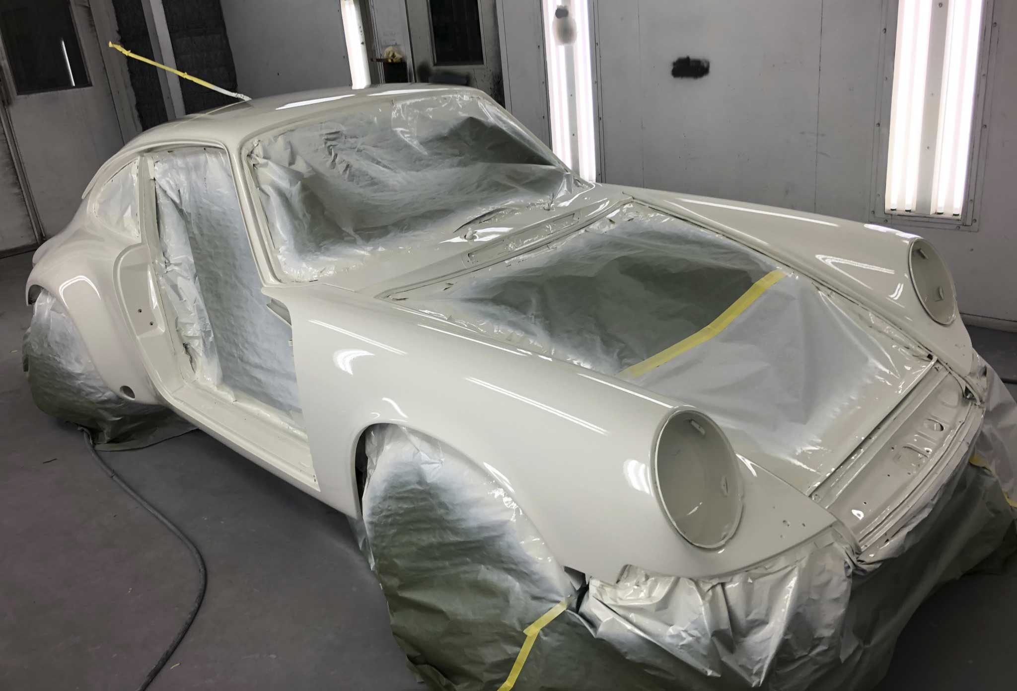a Porsche 911 undergoes a paint job at Kudensport in Southern California